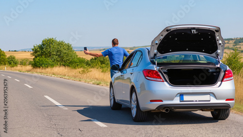 Photos Roadside assistance needed, Broken down car, Vehicle engine failure, Driver call