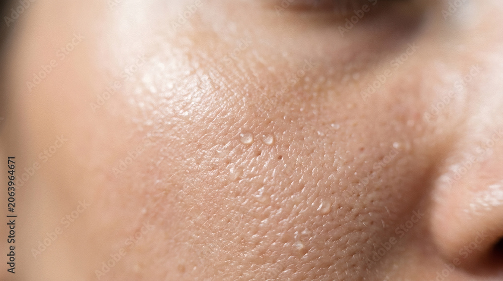Fototapeta premium Moist skin texture close-up on face