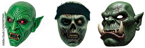 Fotografie Three scary Halloween masks: a green goblin, a zombie, and an orc, isolated on a white background