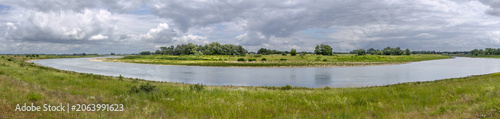 Panoramic view on a bend of the River Meuse in the Maas valley river park on the Netherlands Belgium border, designed for water storage and nature restoration