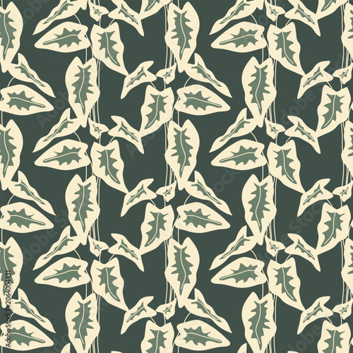 Vector seamless pattern with stylized alocasia or caladium tropical leaves on a dark green background. Elegant jungle foliage ornament for modern fabric, luxury wallpaper, wrapping paper.