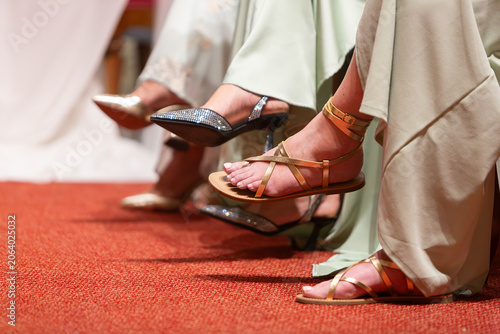 Women wearing elegant stylish footwear at a formal event