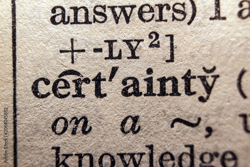 Photos Word certainty on dictionary page, macro close up