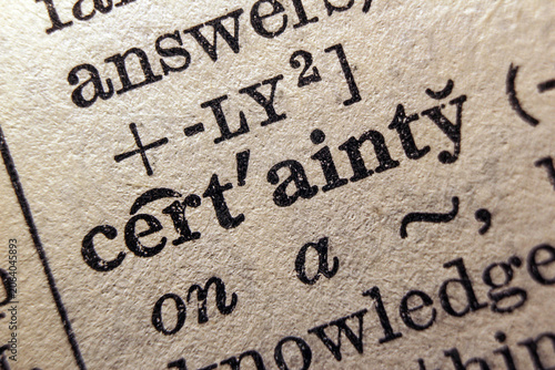 Photos Word certainty on dictionary page, macro close up