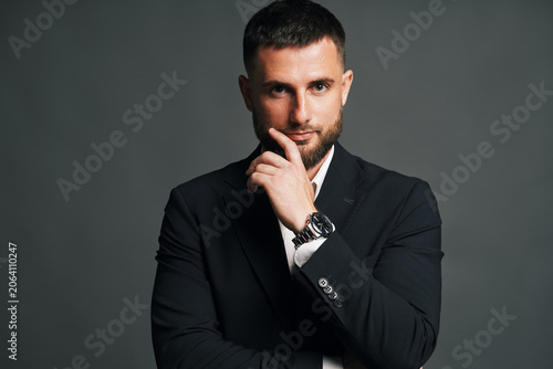Thoughtful handsome man posing in studio