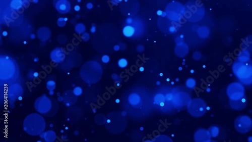 Abstract blue and black dark background.Glowing blue bokeh particles.Circle of lights.Animation loop video.  玉ボケ　光　青　黒　CG  ループ動画　キラキラ　夜　暗い　パーティクル