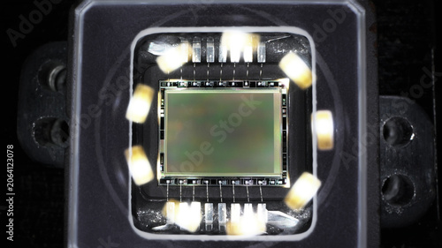 worker disassembled action camera to replace matrix on board microcircuit