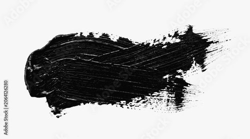 Dense black paint swatch beginning with a smooth curved edge and progr