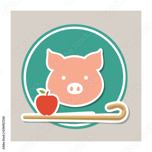 Cartoon pig face with apple and cane in green circle