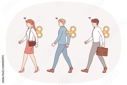 Konstfotografi Business people puppets march in formation, thanks to mechanism for filling them with energy