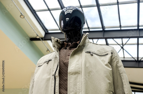 Male mannequin dressed in elegant jacket in shopping mall