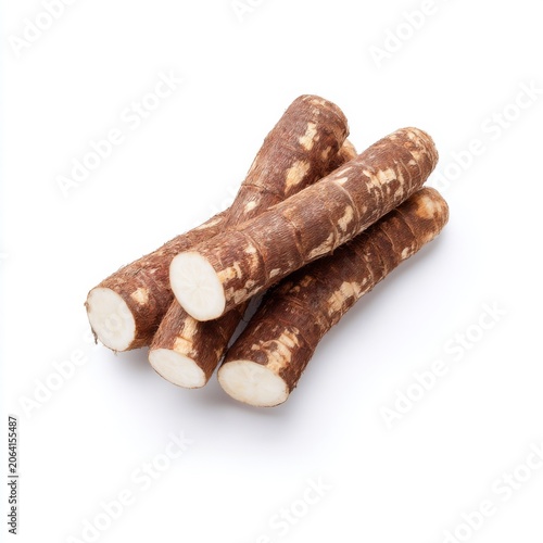 Fresh Cassava Roots for Culinary Use, Natural Ingredients for Healthy Diet and Vegan Cooking, Isolated on White Background