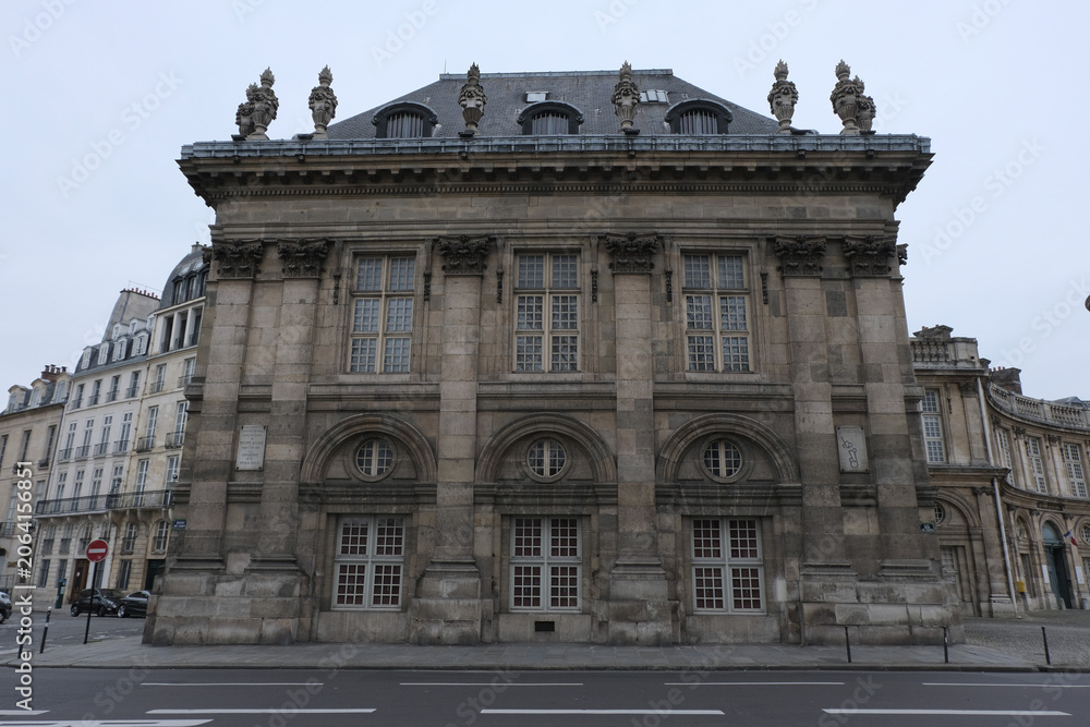 Fototapeta premium Classical/Neoclassical building façades, columns, pediments, Statues, Greco-Roman shapes and design, Ornaments... From this Architectural style inspired by Classical Antiquity. Mostly taken in Paris.