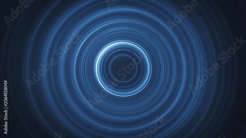 Concentric blue light rings in abstract style on a dark backdrop, conveying a concept of motion and energy flow