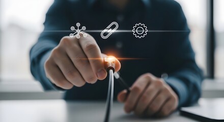 Close up of hand plugging in data cable with connection and gear icons