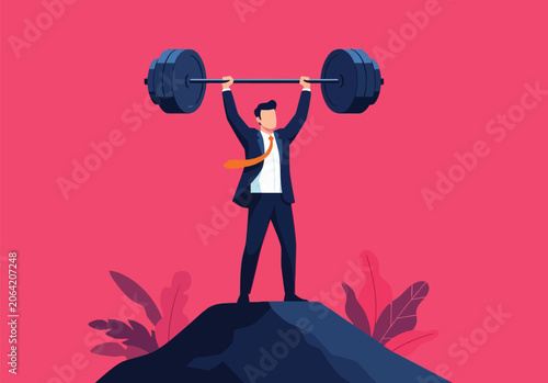 Successful businessman standing on top of mountain peak lifting heavy barbell weight to show strength power ambition and determination in corporate career.