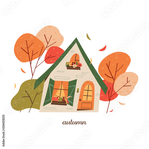 Cozy countryside cottage surrounded by colorful autumn trees and falling leaves. Seasonal harvest scene with warm fall atmosphere
