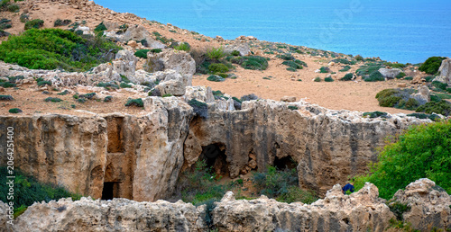 View towards the sea over a royal tomb in the archaeological site near Nea Paphos on Cyprus