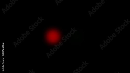 Abstract glowing red and green led indicator lights blinking on black background