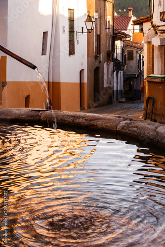 Traditional Stone Fountain Water Reflection in Guadalupe