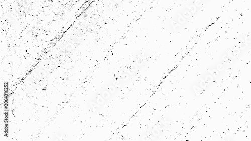 Фотография Distress overlay texture with scattered black specks on a white background