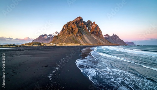 Dramatic Vestrahorn Mountain and Black Sand Beach in Iceland at Sunrise