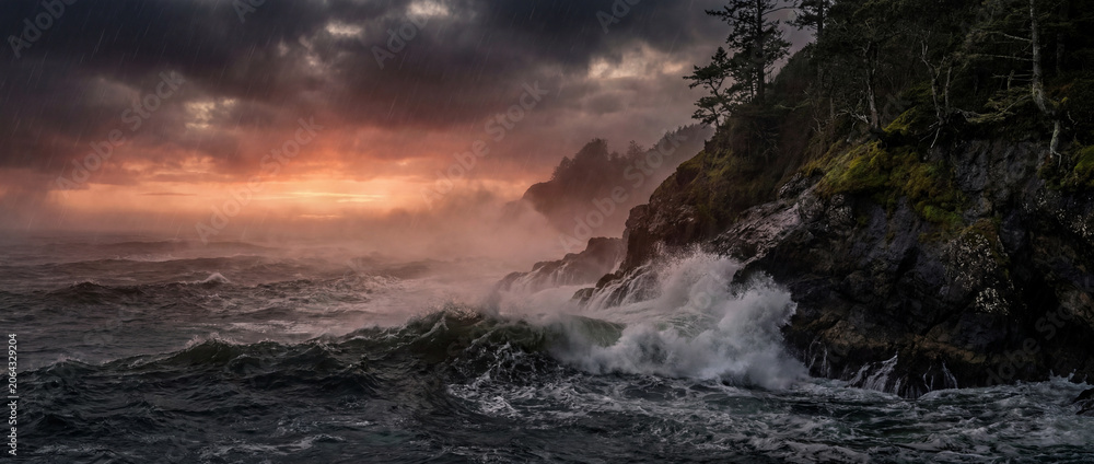 Fototapeta premium Cinematic Storm‑Coast Cliffs with Crashing Waves and Orange Horizon Glow