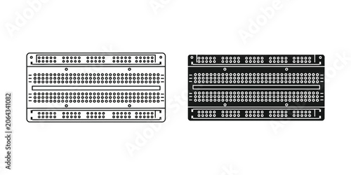Two electronic breadboards in black and white outline contrasting for circuitry prototyping and development