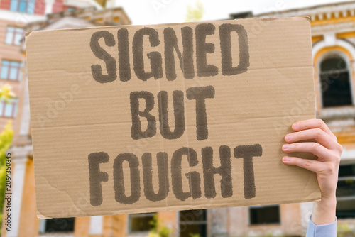 Foto "Signed but fought" Document signed yet battle rages