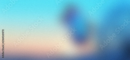 Blurred gradient background with an indistinct oval shape, pastel colors