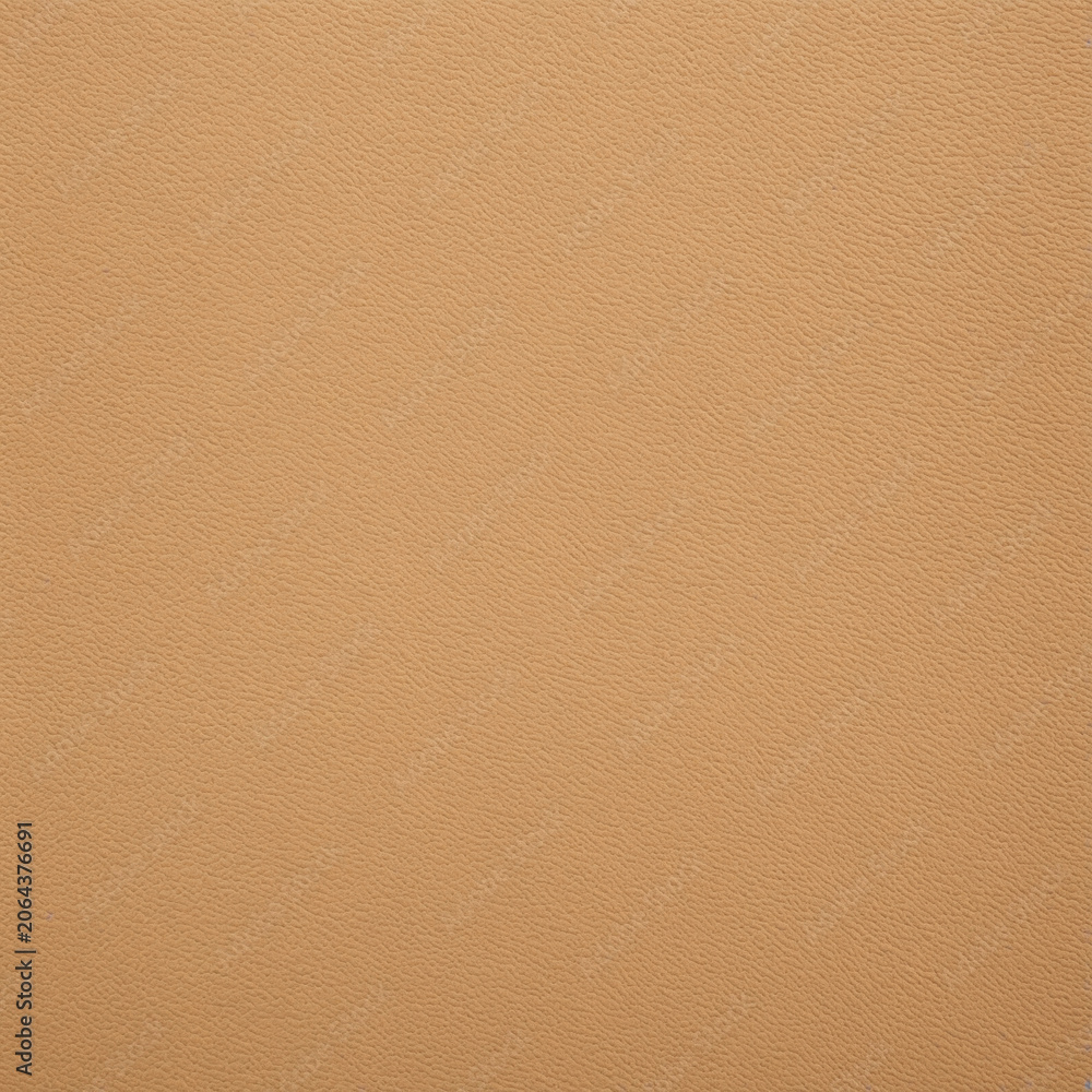 Fototapeta premium Close up texture of light beige leather for background design purposes