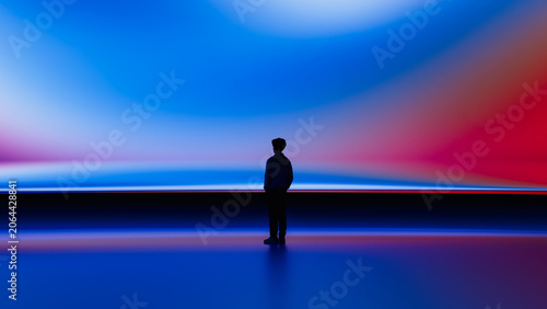 Human silhouette observes screen in a tech setting
