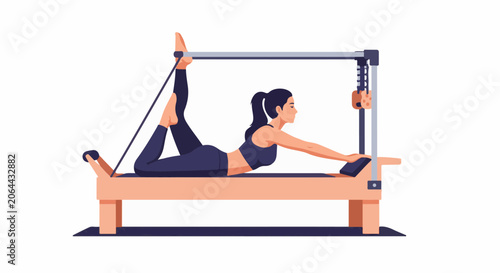 Woman exercising on reformer machine with legs raised