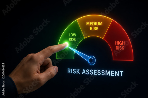 A person touching a digital risk assessment gauge screen showing a green low risk level with glowing colorful light effects on a dark background