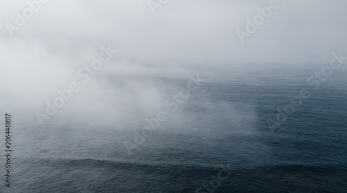 Misty Ocean Horizon with Gentle Waves