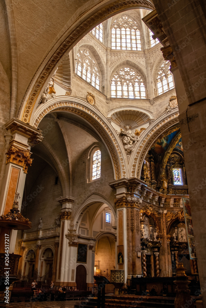 Fototapeta premium Majestic Gothic Cathedral Interior with Decorative Arches and Stained Glass