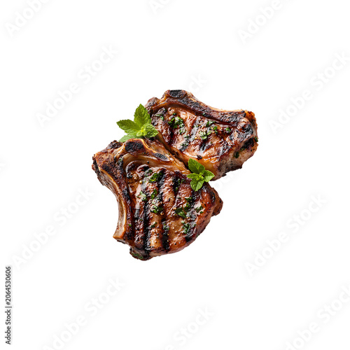 Two grilled lamb chops with mint on transparent background