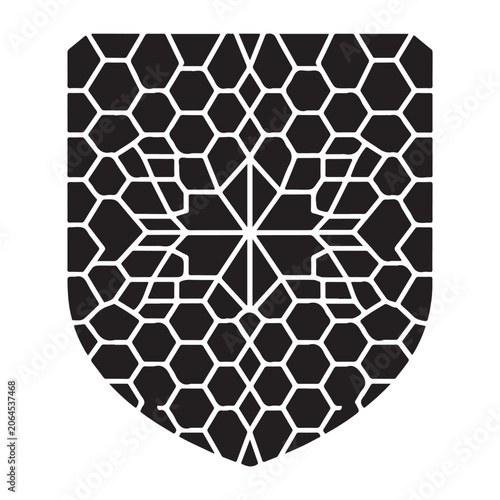 Isolated black shield emblem featuring a complex repeating geometric honeycomb pattern with a central starlike motif