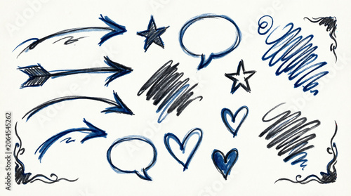 Blue ink scribble elements and speech bubbles for creative page designs.