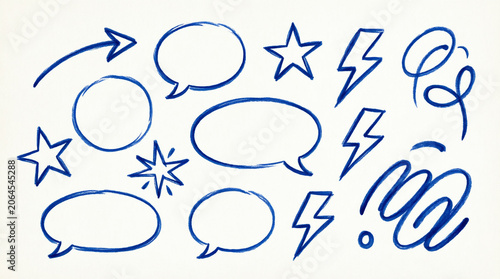 Set of blue marker design elements including lightning bolts and bubbles.