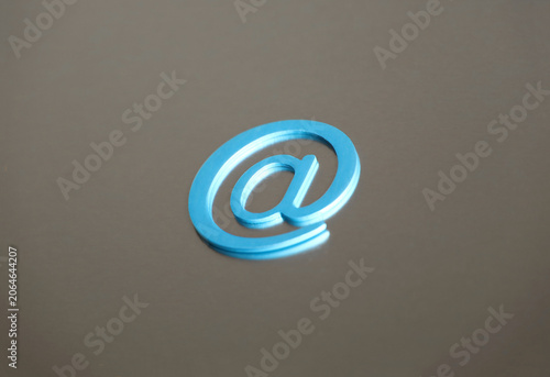 email symbol paperclips on iron plate background, concept of internet communication