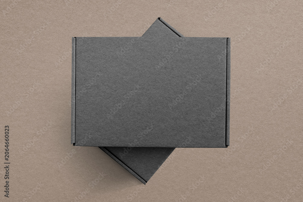 Fototapeta premium Minimalist black cardboard packaging design, suitable as mockup