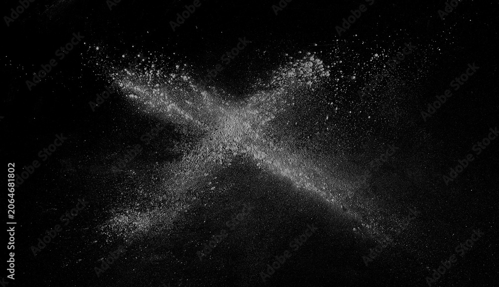 Fototapeta premium White powder scattered on black background, clipping path
