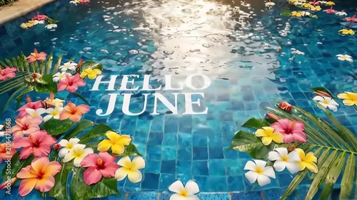 Luxury Swimming Pool Floating with Tropical Flowers and Hello June Text
