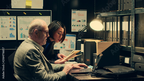 Obraz na plátně Investigators studying historical maps of crime scenes using federal classified records, officers reconstruct timelines using archived folders, detectives conducting private investigation