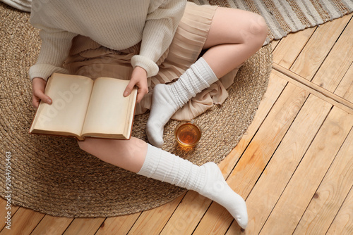 Cozy home reading with open...
