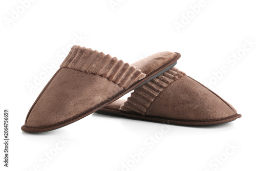 Soft brown slippers on whit...