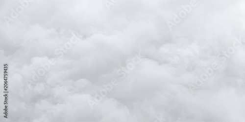Photos Cloudscape Overcast: Soft, diffused light filters through a thick blanket of grey clouds, creating a serene and introspective atmosphere in the sky
