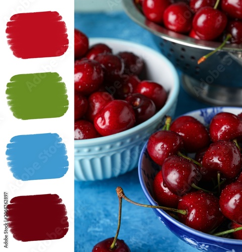 Fotografie Freshly washed red cherries in blue bowls and metal colander on textured blue ba