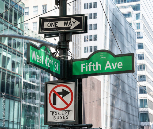 Street sign at the corner of Fifth Avenue and West 42nd street.